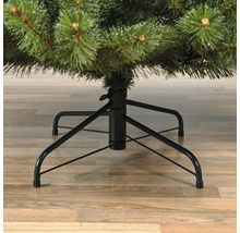 Detailansicht eines künstlichen Weihnachtsbaums mit Metallständer.