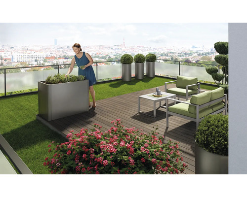Dachterrasse mit Bepflanzung, Rasenfläche und Sitzgruppe