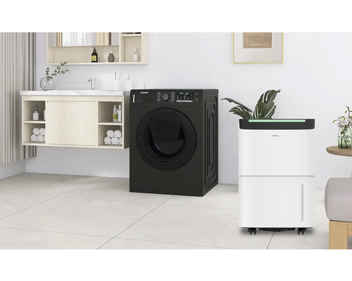 Eine Waschküche mit einer Samsung Waschmaschine und einem Luftentfeuchter.