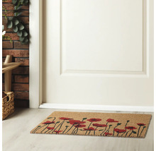 Fußmatte aus Kokosfaser mit Mohnblumenmuster vor einer Tür