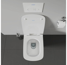 Aufnahme von oben einer Toilette mit Spülkasten und Toilettenpapierhalter