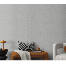 Nahaufnahme einer grauen Vliestapete mit feiner Textur