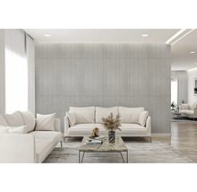 Wohnzimmer mit Sofas, Couchtisch und strukturierter Wandverkleidung für eine moderne Raumgestaltung.