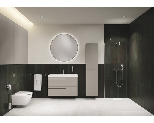 Modernes Badezimmer mit Dusche, Waschtisch, Spiegelschrank, Toilette und runden Spiegel