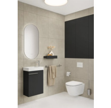 Modernes Badezimmer mit Waschtisch, Spiegel, Toilette und Accessoires