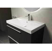 Waschtischunterschrank mit Waschbecken und Armatur im Badezimmer.
