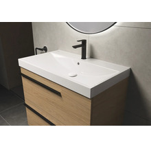 Waschtischunterschrank mit Waschbecken und Armatur im Badezimmer.