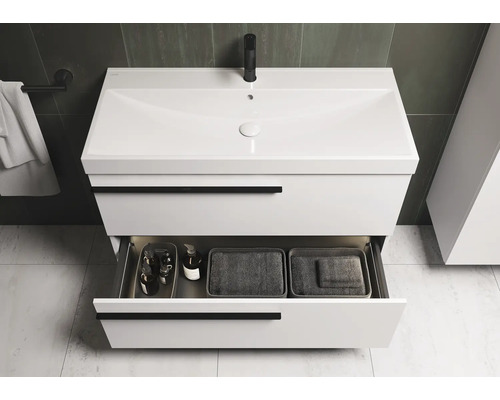 Weißer Waschtisch mit offenem Schubfach im Badezimmer