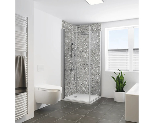 Helles Badezimmer mit Dusche, Toilette, Heizkörper und Zimmerpflanze