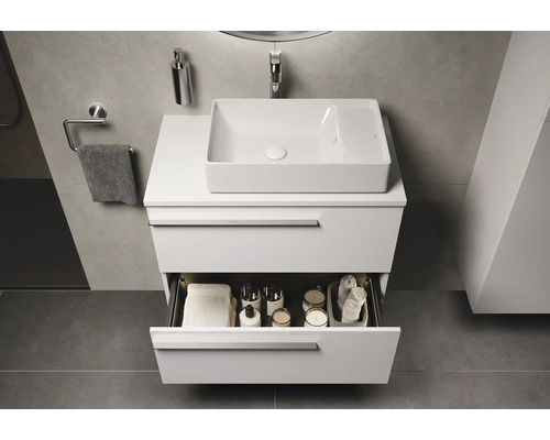 Waschtisch mit offenem Schubfach und Aufsatzwaschbecken im Badezimmer