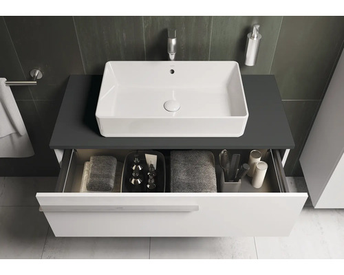 Waschtisch mit Schublade und rechteckigem Aufsatzwaschbecken im Badezimmer