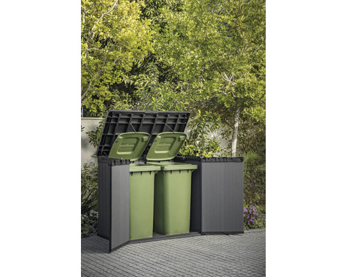 Mülltonnenbox aus Kunststoff mit zwei grünen Mülltonnen im Garten