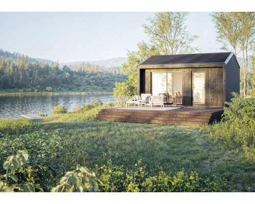 Modulares Gartenhaus mit Holzterrasse am See