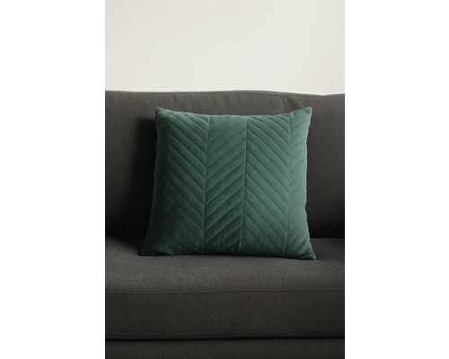 Dekokissen mit Chevron-Muster auf einem Sofa