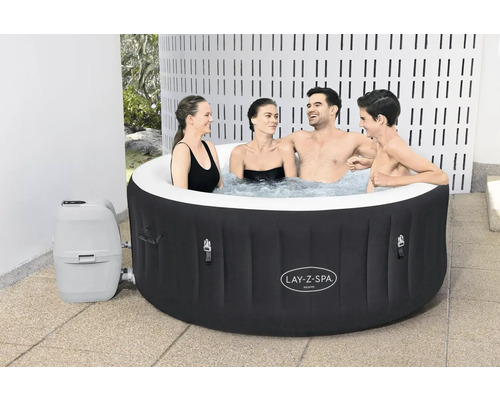 Aufblasbarer Lay-Z-Spa Whirlpool Miami mit vier Personen im Wasser