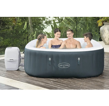Aufblasbarer Lay-Z-Spa Ibiza Whirlpool mit vier Personen auf einer Holzterrasse.