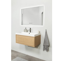 Waschtisch mit Spiegel und Unterschrank im Badezimmer