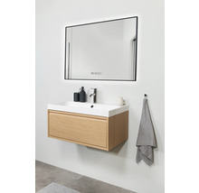 Modernes Badezimmer mit Waschtischunterschrank, Aufsatzwaschbecken und beleuchtetem Spiegel