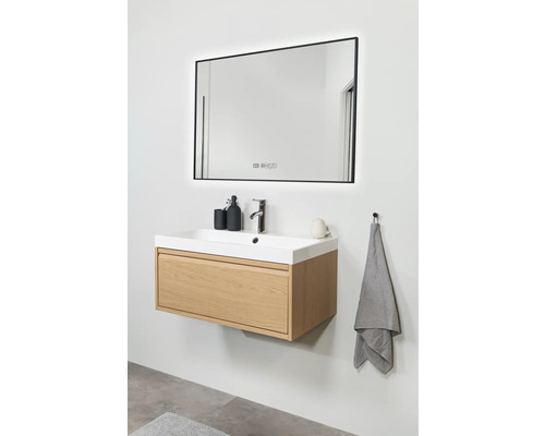 Modernes Badezimmer mit Waschtischunterschrank, Aufsatzwaschbecken und beleuchtetem Spiegel