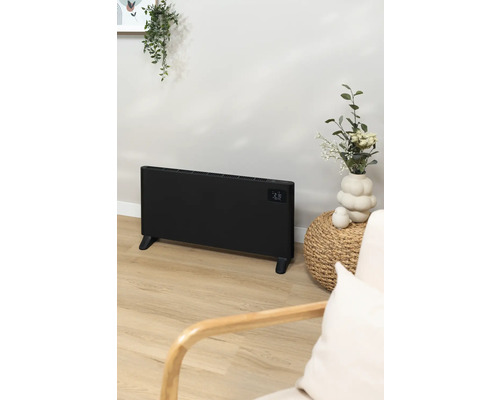 Schwarzer Heizkörper im Wohnzimmer