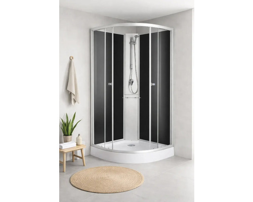 Eckdusche mit schwarzem Glas und silberfarbenen Rahmen in einem hellen Badezimmer