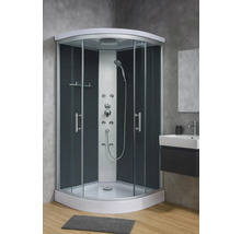 Komplette Duschkabine mit Duschkopf und Armaturen in einem Badezimmer.