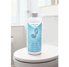 Flasche Urinsteinentferner im Badezimmer