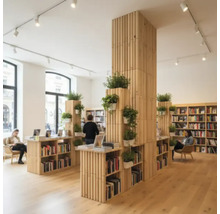 Innenansicht einer Buchhandlung mit Regalen, Pflanzen und Lesebereich.