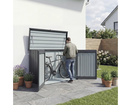 Fahrradbox aus Metall mit geöffneten Türen und einer Person, die ein Fahrrad hineinstellt.