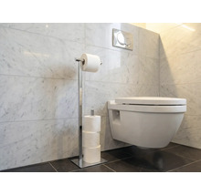 Badezimmer mit Toilette und Toilettenpapierhalter aus Metall