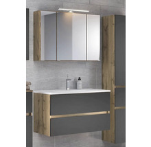 Modernes Badezimmermöbel-Set mit Spiegelschrank, LED-Leuchte, dunklem Waschtischunterschrank in Holzoptik und weißem Waschbecken.