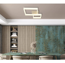 Modern gestaltete Deckenleuchte in einem hellen Raum.