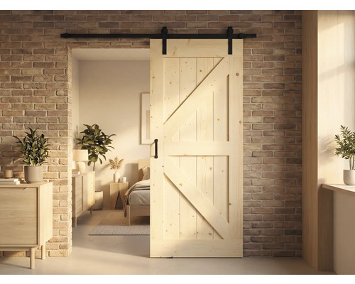 Holzschiebetür mit Beschlägen vor einer Backsteinwand