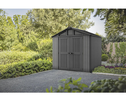 Gartenhaus Keter Stronghold 8x6 inkl. Fußboden 252 x 174,9 cm anthrazit Gartenschuppen aus Kunststoff mit Doppeltür vor Bäumen und Büschen