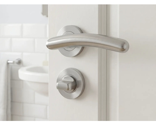 Türbeschlag-Set mit Griff und Drehknopf auf einer weißen Tür