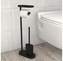 Freistehende WC-Garnitur mit Toilettenpapierhalter, Ablage und Toilettenbürste in einem hellen, modern organisierten Badezimmer neben einem WC.