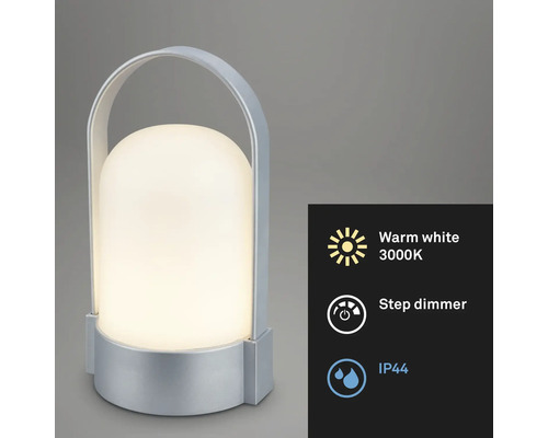 Tragbare LED-Tischleuchte mit silberfarbenem Gehäuse und Griff, warmweißes Licht 3000 Kelvin, Stufendimmer und Schutzart IP44.