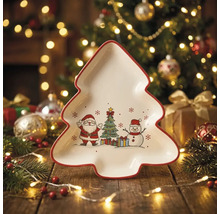 Tannenbaumförmiger Servierteller aus Keramik mit Motiven von Weihnachtsmann, Christbaum und Schneemann auf einem festlich beleuchteten Holztisch.