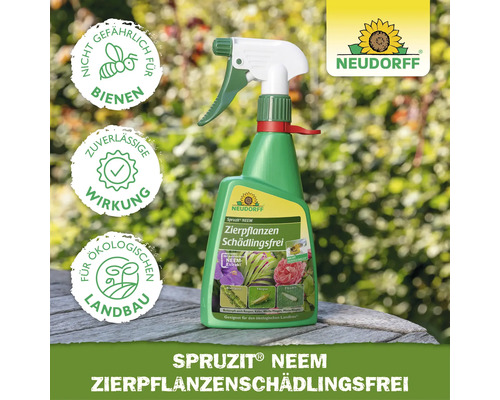 Neudorff Logo. Spruzit Neem Zierpflanzen Schädlingsfrei auf Holztisch in hellem Garten mit Symbolen für Bienenschutz und ökologischen Landbau.