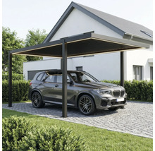 Moderner Carport aus Aluminium in Dunkelgrau mit integrierter LED-Beleuchtung über einem SUV auf gepflasterter Einfahrt vor einem Wohnhaus.
