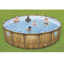 Bestway Steel Pro MAX runder Aufstellpool in Holzoptik mit fünf Personen im Wasser auf einer Rasenfläche.