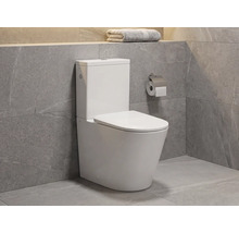 Modernes Stand-WC aus Keramik mit Spülkasten in einem Badezimmer mit grauen Fliesen in Natursteinoptik.