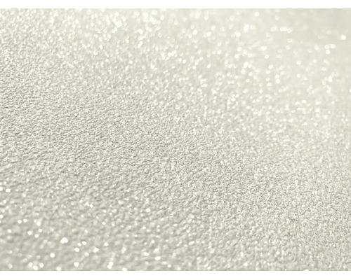 Strukturierte Oberfläche mit funkelnden Glitzerpartikeln.