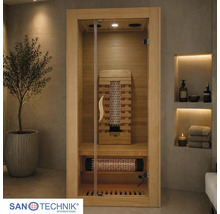 Infrarotkabine aus Holz mit Glastür, integrierten Strahlern und Sitzbank in modernem Wellness-Ambiente. San Technik International Logo.