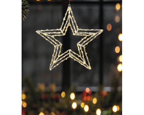 LED-Weihnachtsstern mit Kristalleffekt und warmweißen Lichtern, hängend vor einem Fenster als festliche Dekoration.