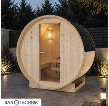 Runde Fasssauna aus Holz mit Glastür und dunklem Dach, beleuchteter Innenraum mit Holzbänken auf einer Terrasse. Sanotechnik Logo.