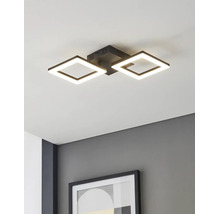 Moderne LED-Deckenleuchte mit zwei quadratischen schwarzen Rahmen, montiert an einer weißen Decke über einer grauen Wand mit gerahmtem Bild.