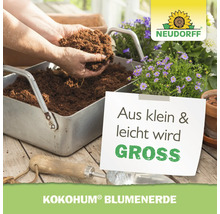 Neudorff Kokohum Blumenerde in einer Pflanzschale mit Blumen und Neudorff Logo