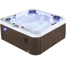 Quadratischer Whirlpool mit brauner Verkleidung und sprudelndem Wasser