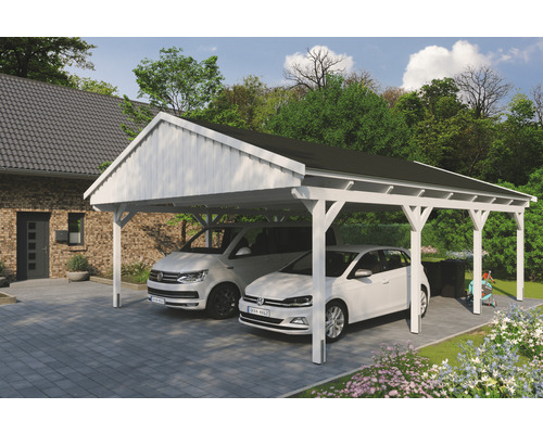 Doppelcarport SKAN Holz Fichtelberg inkl. Dachschindeln schwarz 618 x 808 cm weiß Doppelcarport aus Holz mit zwei parkenden Autos auf einem gepflasterten Hof.